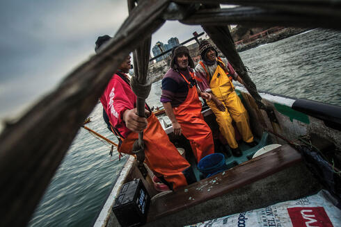 Fishermen finishing morning work 