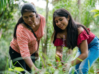 Chela Elena Umire works with her daughter in Colombian Amazon