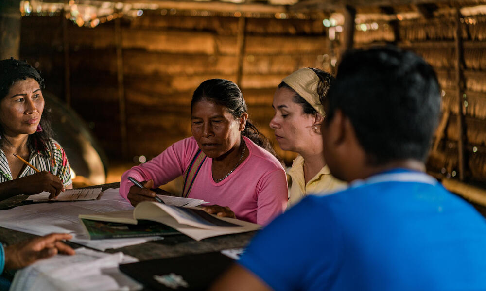 Environmental Assessment team in Amazon, Colombia with members from WWF and La Chorrera Indigenous tribe