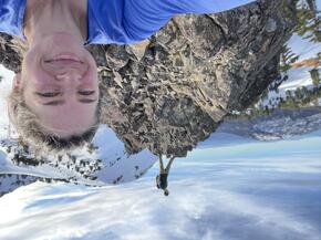 Annika Terrana in front of a snow-covered mountain