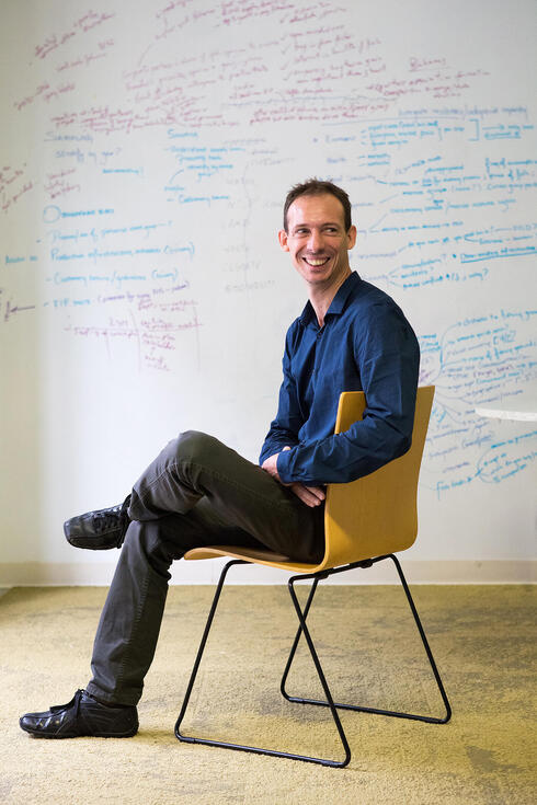 Arnaud Lyet sitting in a chair