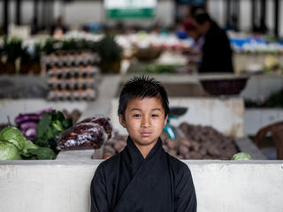 A boy in a market in Bhutan