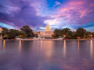 US Capitol building with a dramatic sky