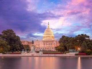 Capitol building with a dramatic sky