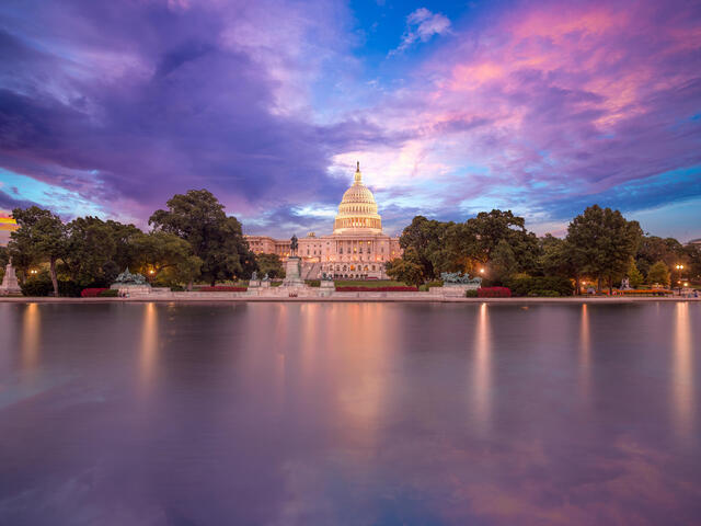 Capitol building with a dramatic sky