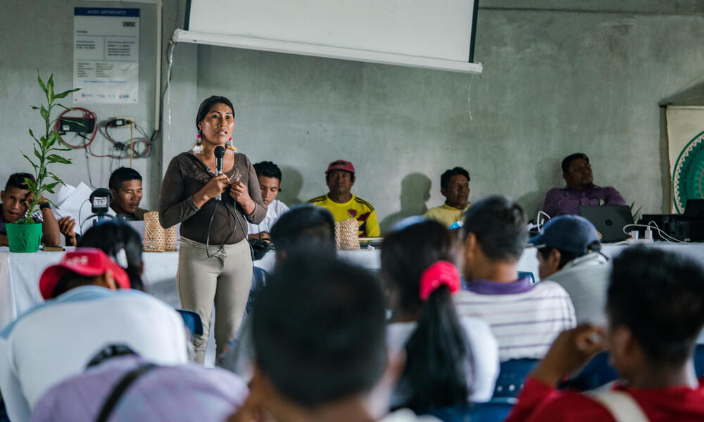 Chela Umir presents her work to the community