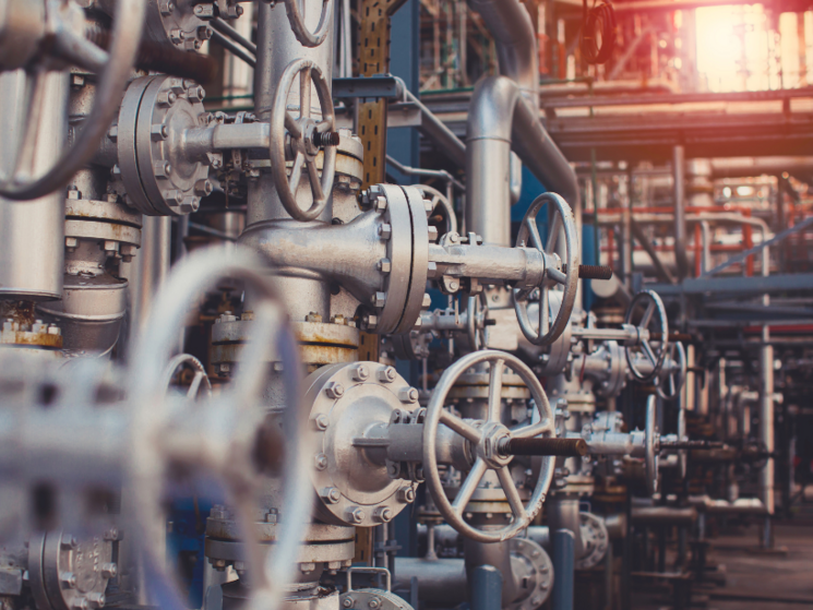 Close up of pipes and valves in a factory