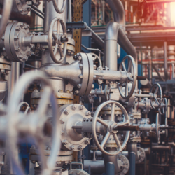 Close up of pipes and valves in a factory