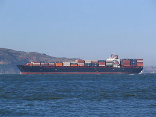 A large container cargo vessel ship sailing in Santa Barbara