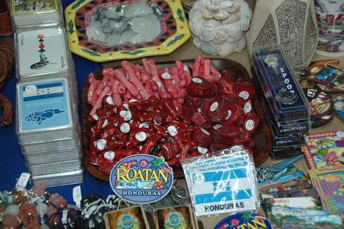 Pink and red coral for sale at a market