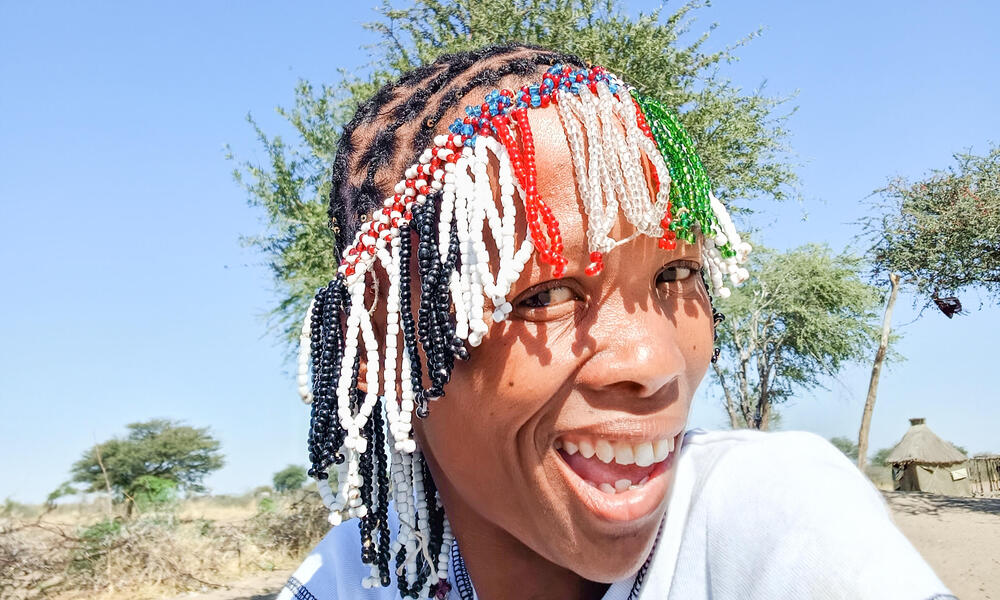 N!ae Sao smiles for a selfie in Nama Pan Village