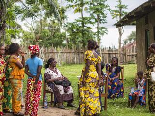 A group of women gather to discuss local conservation issues in the Democratic Republic of Congo 