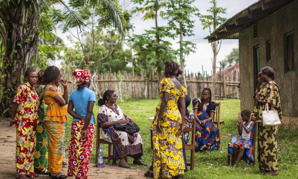 A group of women gather to discuss local conservation issues in the Democratic Republic of Congo 