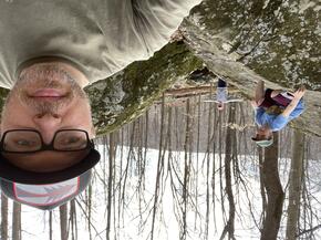 Dan Buchner and his two children in a forest