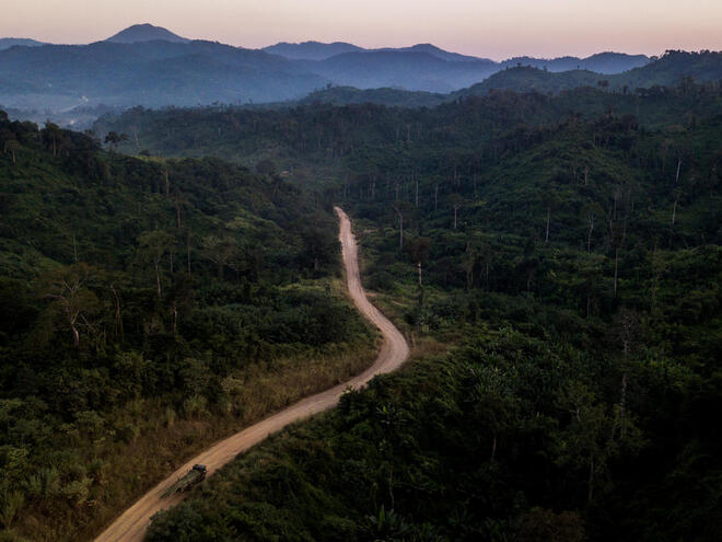 Aerial view of the Dawei Road cutting through forest and mountains