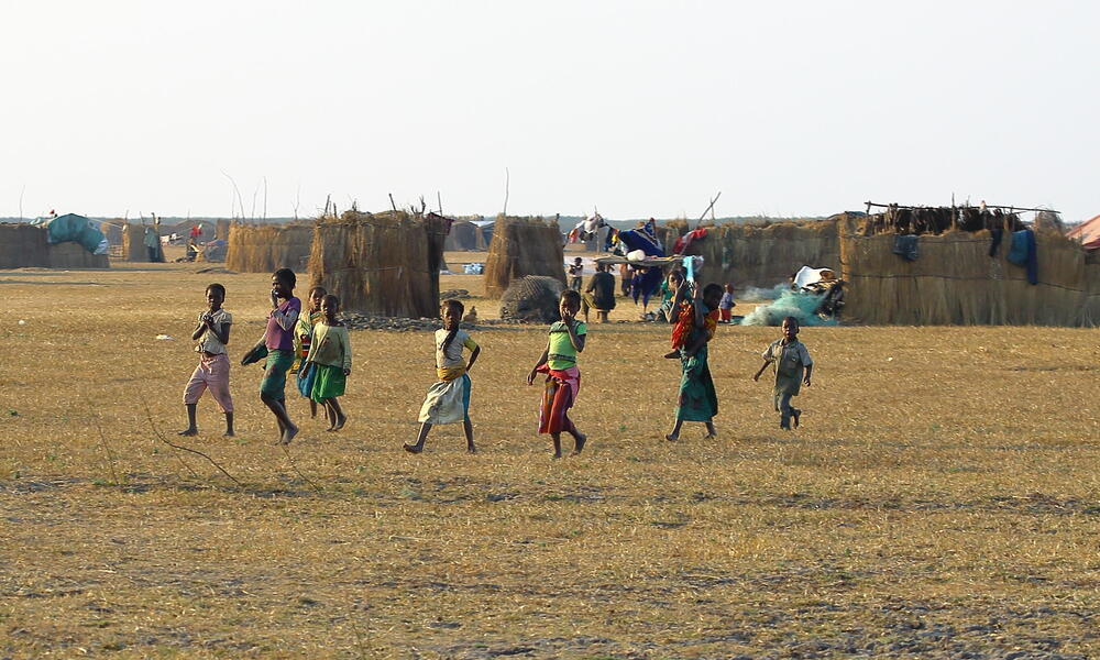 children walking in village