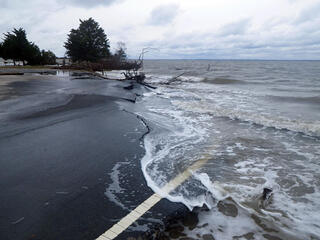 A street that's broken floods during a storm