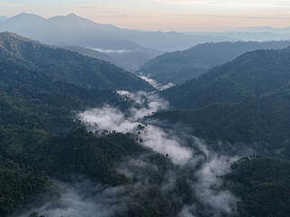 Fog over mountains in Nam Poui Laos