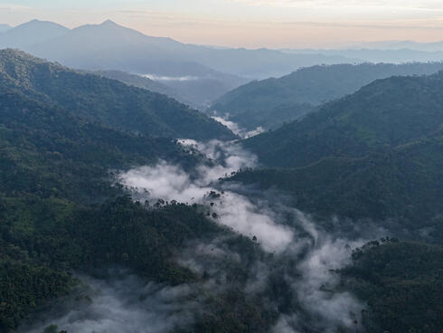 Fog over mountains in Nam Poui Laos