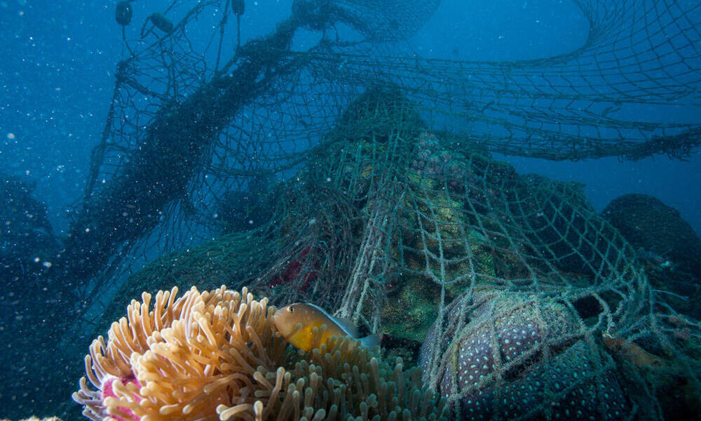 Abandoned fishing net. Ghost net environmental ocean pollution