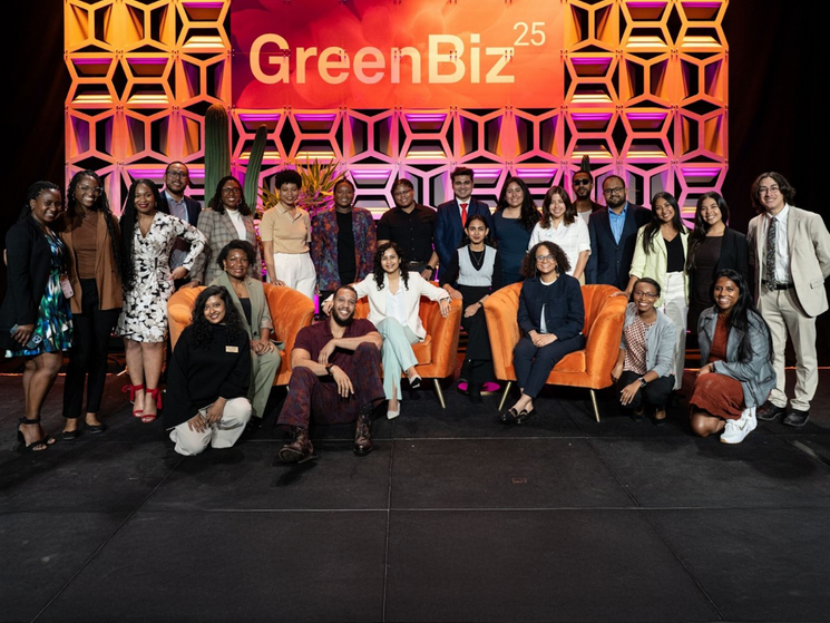A group of about 20 people on a stage