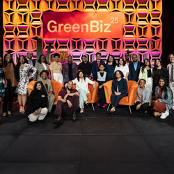 A group of about 20 people on a stage
