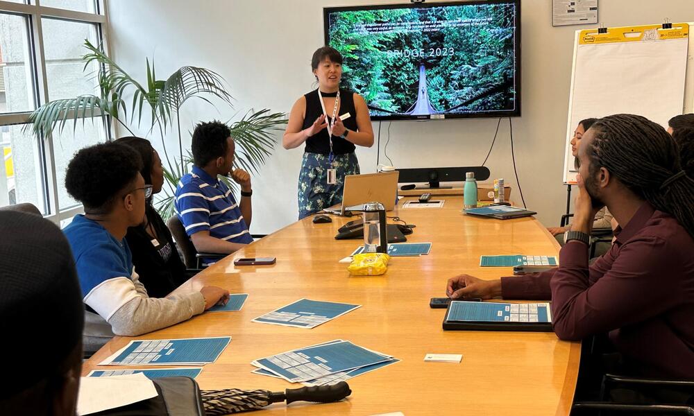 Jessica Leung of the DEI team presents to students at the HBCU career fair hosted at WWF-US headquarters in DC about the BRIDGE program.