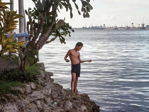 Boy on the shore in Honduras