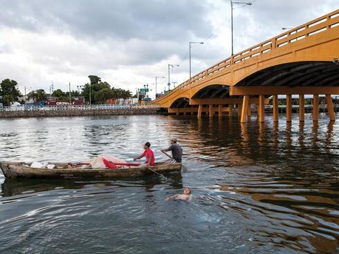Men in a boat in Honduras