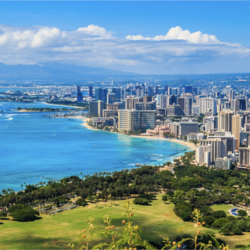The beach and city skyline of Honolulu, Hawaii. 
