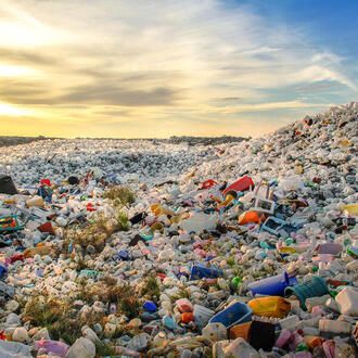 Mounds of plastic bottle waste and other types of plastic waste at the Thilafushi waste disposal site.