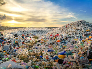Mounds of plastic bottle waste and other types of plastic waste at the Thilafushi waste disposal site.