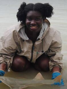 Jasmin holding a sawfish