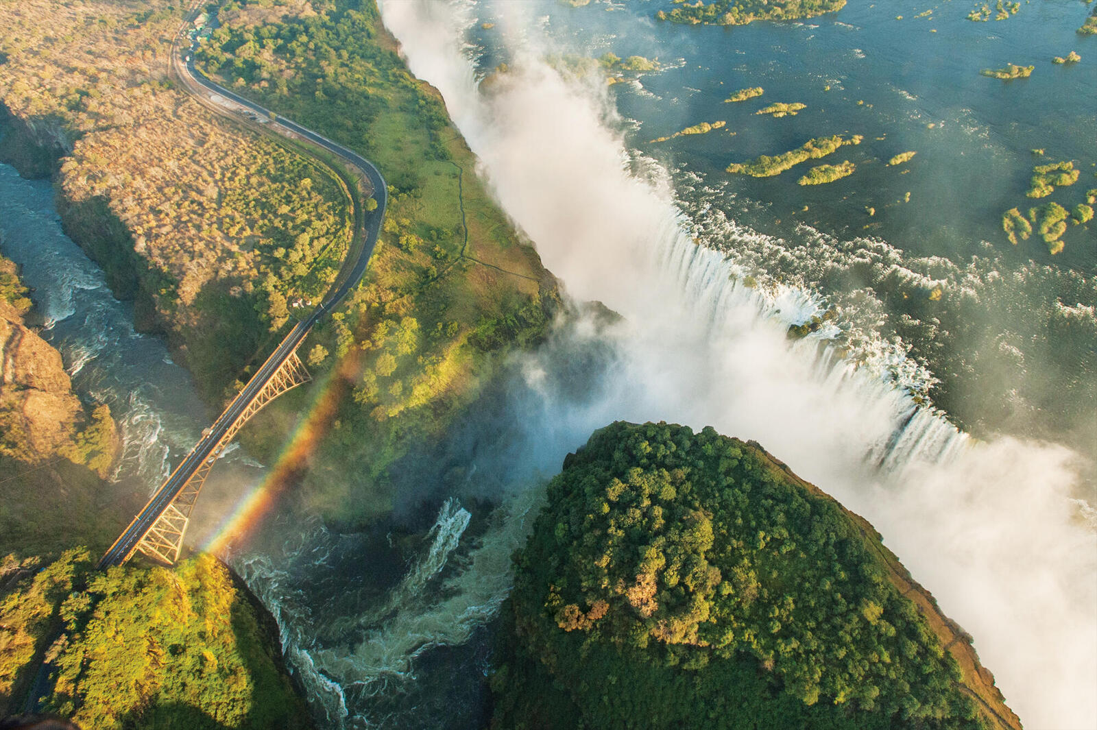 Aerial view of Victoria Falls with rainbow