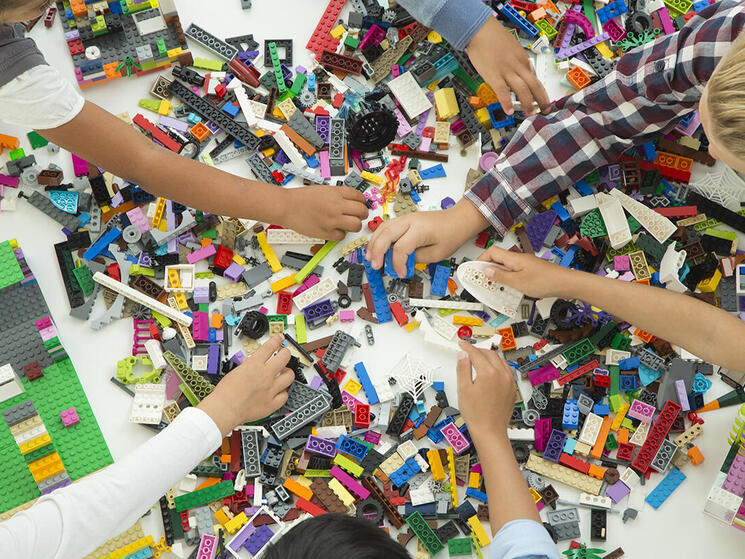 Children play with LEGO bricks