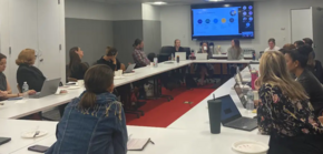 people sitting around a conference table