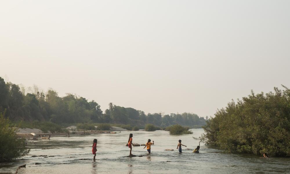 Children play in the Meoking river.
