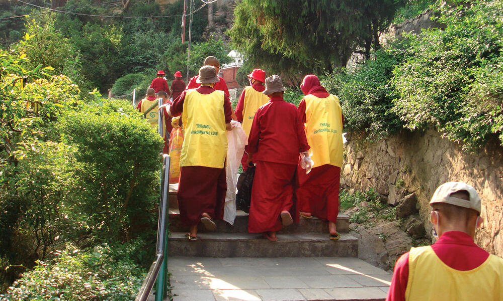 monks on stairs