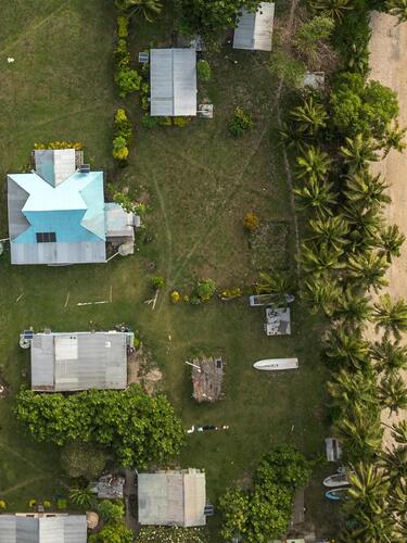 Aerial view of coastal Nacula Village on Yasawa Islands, Village