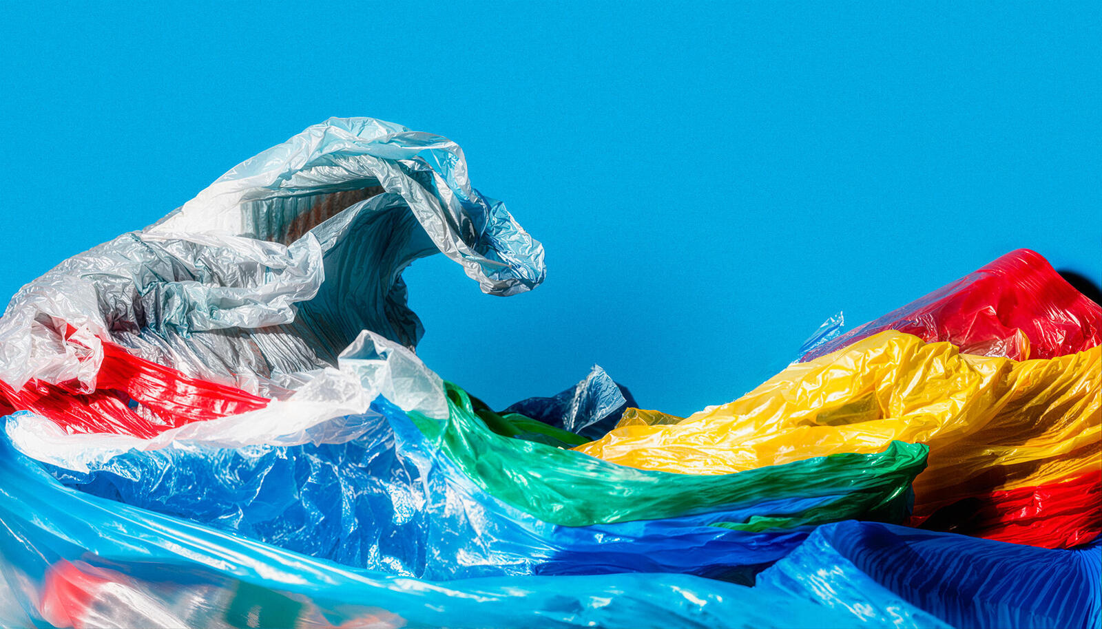 Colorful plastic bags molded into the shape of a wave