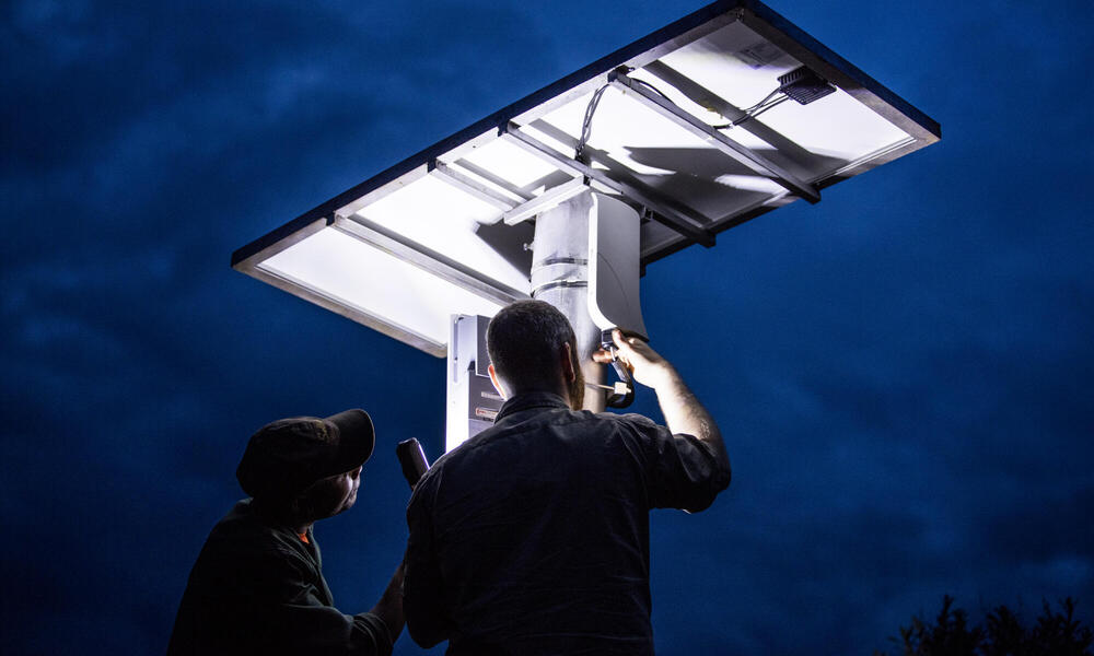 Tower-mounted solar panels for FLIR camera