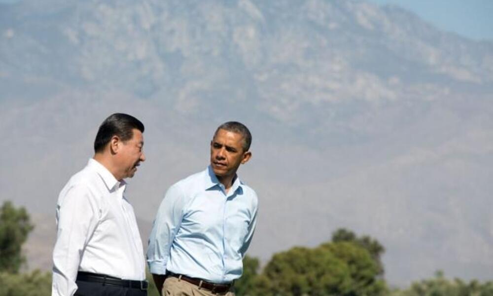 President Barack Obama walks with President Xi Jinping of the People's Republic of China at Annenberg Retreat in California.