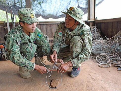 Rangers demonstrate a snare. 