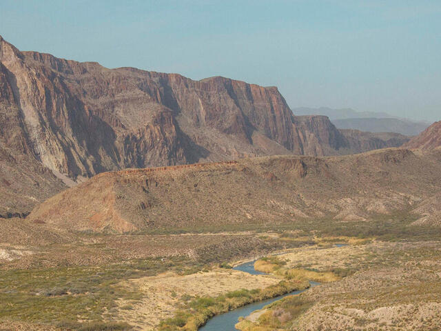 A desert landscape and the Rio Grande