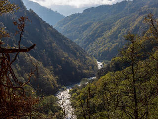 A river running through a valley in Trongsa district, Bhutan.