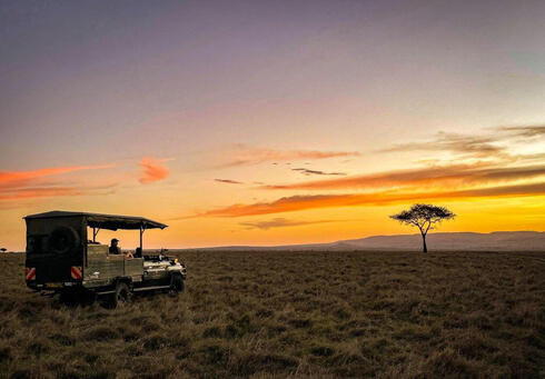 Sunset with safari truck