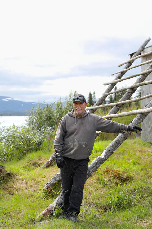 Jensen standing shoreside