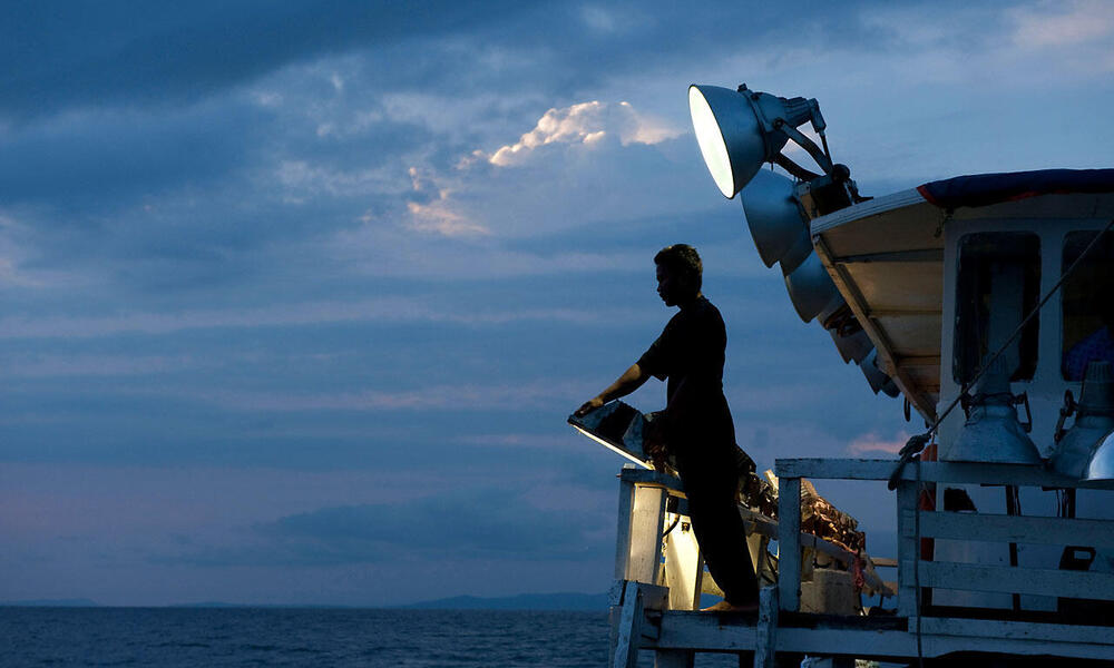 ship lights over water