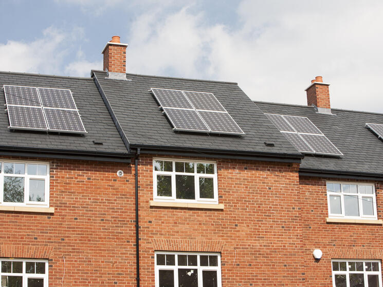 Solar panels on new build housing in Macclesfield, Cheshire, UK.