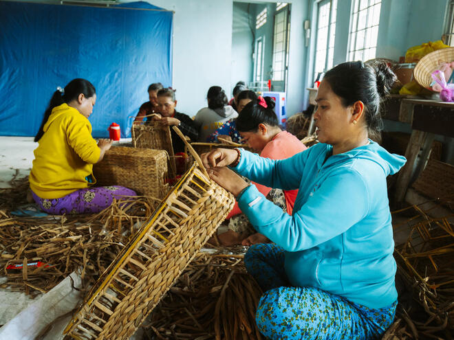 Women weaving baskets